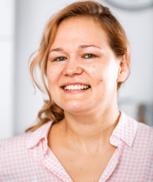 Happy woman smiling at camera